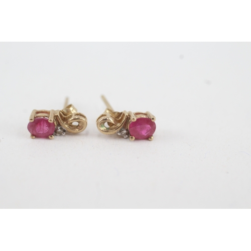 119 - 9ct gold diamond and ruby set stud earrings (1.1g)