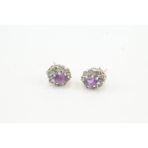 121 - 9ct gold diamond and amethyst set cluster stud earrings (1.4g)