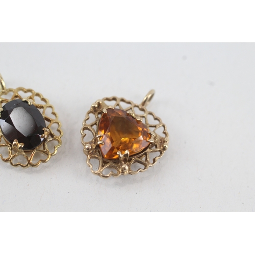 122 - 2 x 9ct gold vintage citrine & garnet pendants (3.8g)