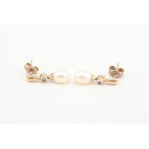 124 - 9ct gold cultured pearl & diamond drop earrings (1.4g)