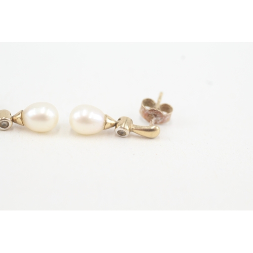 124 - 9ct gold cultured pearl & diamond drop earrings (1.4g)