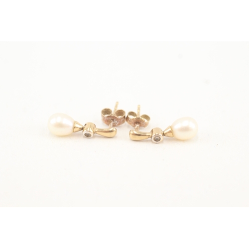 124 - 9ct gold cultured pearl & diamond drop earrings (1.4g)