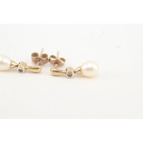 124 - 9ct gold cultured pearl & diamond drop earrings (1.4g)