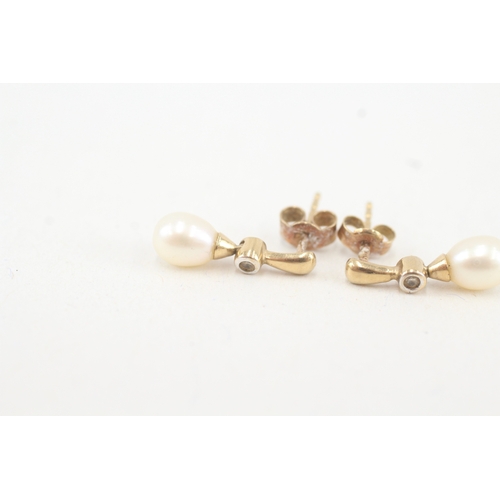 124 - 9ct gold cultured pearl & diamond drop earrings (1.4g)