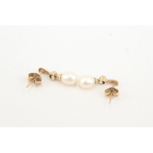 124 - 9ct gold cultured pearl & diamond drop earrings (1.4g)