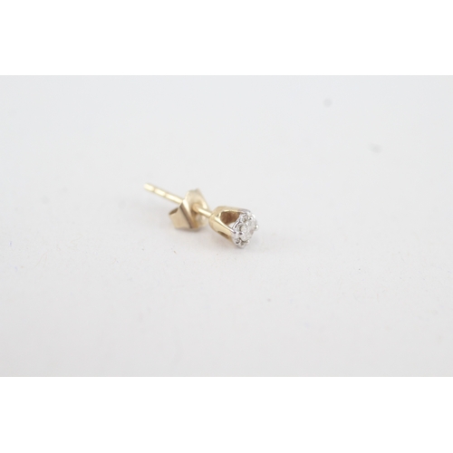 129 - 2 x 9ct gold diamond stud earrings (1.5g)