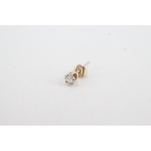 129 - 2 x 9ct gold diamond stud earrings (1.5g)