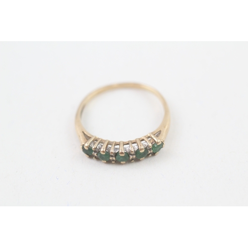 132 - 9ct gold emerald & diamond eternity ring, claw set (1.5g) Size  O 1/2