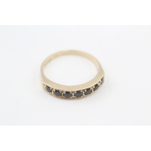 133 - 9ct gold sapphire half eternity ring (2.4g) Size  R