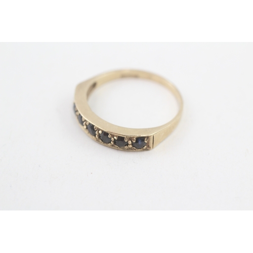 133 - 9ct gold sapphire half eternity ring (2.4g) Size  R