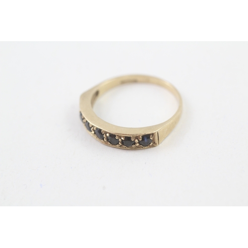 133 - 9ct gold sapphire half eternity ring (2.4g) Size  R