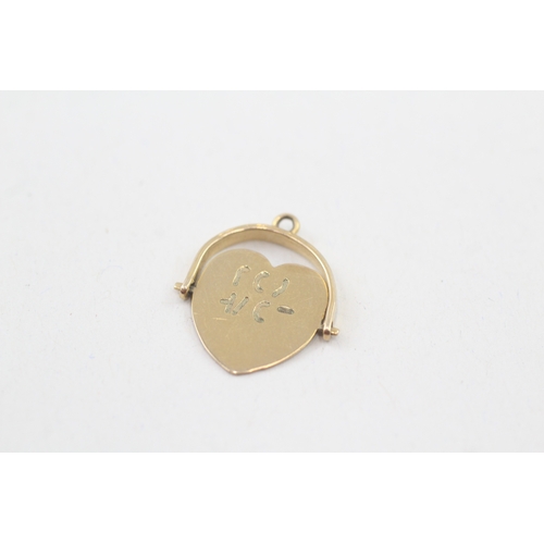 24 - 9ct gold vintage 'I love you' spinning heart shape charm (1.1g)