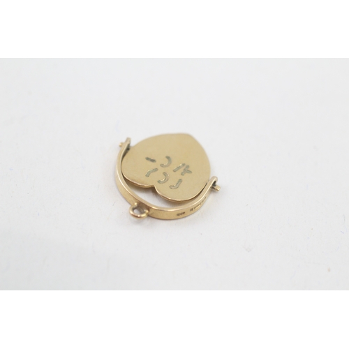 24 - 9ct gold vintage 'I love you' spinning heart shape charm (1.1g)