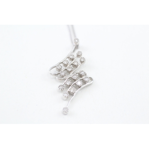 49 - 9ct white gold diamond abstract pendant necklace (3.5g)