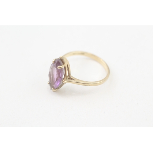 57 - 9ct gold marquise cut amethyst set cocktail ring (2.4g) Size  O