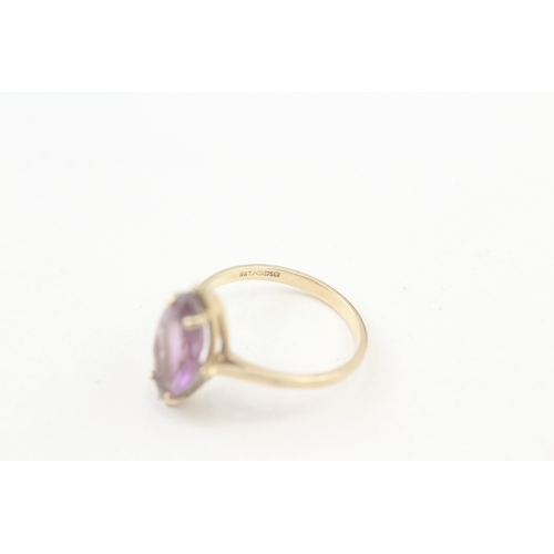 57 - 9ct gold marquise cut amethyst set cocktail ring (2.4g) Size  O