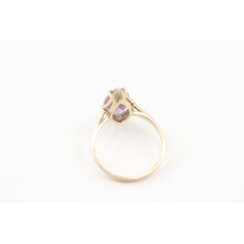 57 - 9ct gold marquise cut amethyst set cocktail ring (2.4g) Size  O