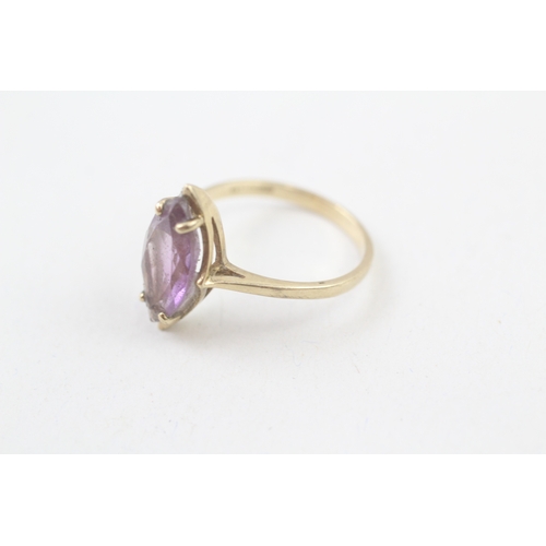 57 - 9ct gold marquise cut amethyst set cocktail ring (2.4g) Size  O