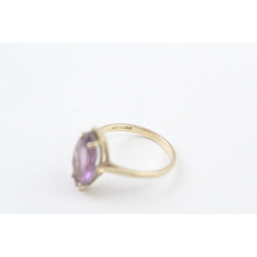 57 - 9ct gold marquise cut amethyst set cocktail ring (2.4g) Size  O