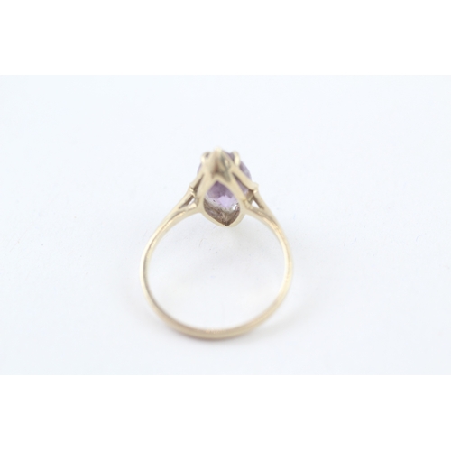 57 - 9ct gold marquise cut amethyst set cocktail ring (2.4g) Size  O