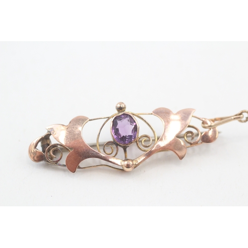 76 - 9ct gold antique oval cut amethyst brooch (2.6g)