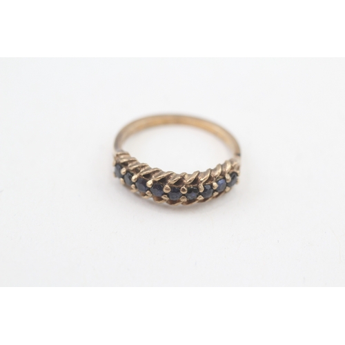 77 - 9ct gold vintage sapphire half eternity ring (2.2g) Size  L 1/2