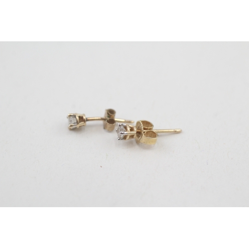 79 - 9ct gold diamond single stone stud earrings (0.4g)