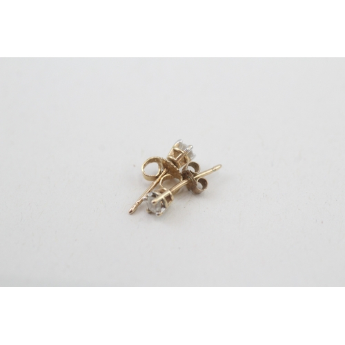 79 - 9ct gold diamond single stone stud earrings (0.4g)