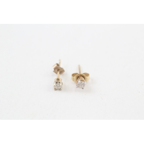 79 - 9ct gold diamond single stone stud earrings (0.4g)