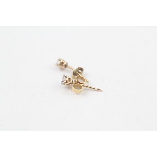 79 - 9ct gold diamond single stone stud earrings (0.4g)