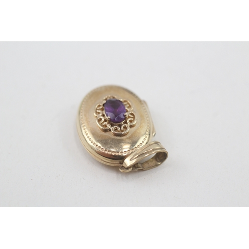 81 - 9ct gold vintage style amethyst patterned locket (2.3g)