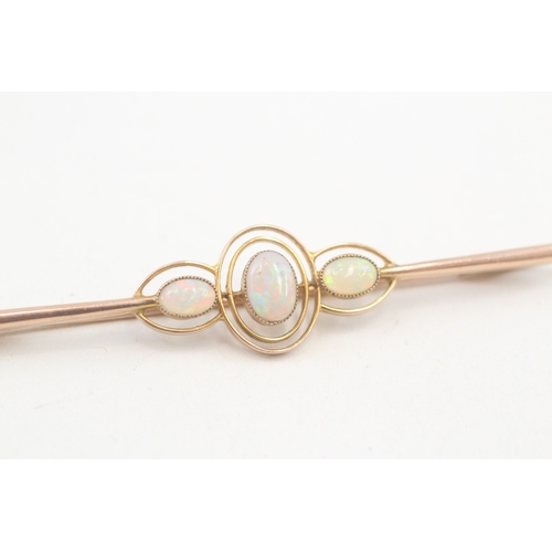 85 - 9ct gold Edwardian cabochon cut opal brooch with a milgrain edge (2.8g)