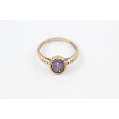 86 - 9ct gold oval cut amethyst & diamond ring, bezel set (2g) Size  P