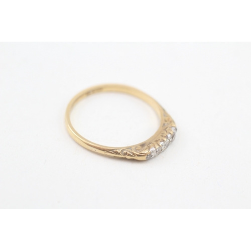 88 - 18ct gold antique diamond ring with a patterned gallery (2.3g) Size  P