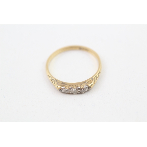 88 - 18ct gold antique diamond ring with a patterned gallery (2.3g) Size  P