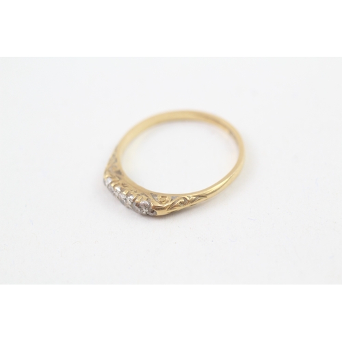 88 - 18ct gold antique diamond ring with a patterned gallery (2.3g) Size  P