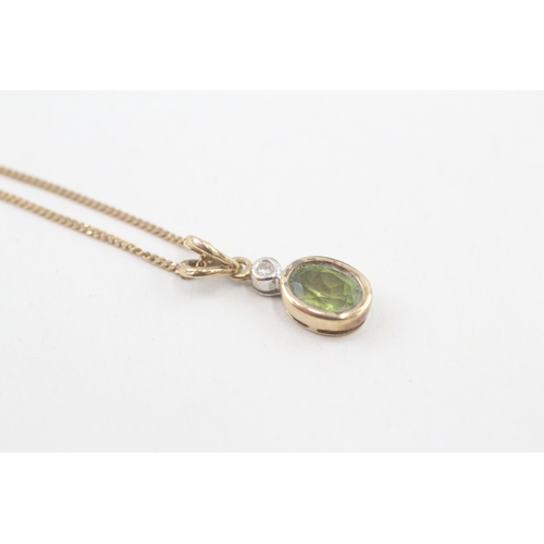 93 - 9ct gold peridot & diamond pendant necklace, bezel set (2.4g)