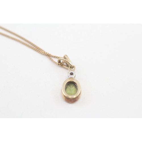 93 - 9ct gold peridot & diamond pendant necklace, bezel set (2.4g)