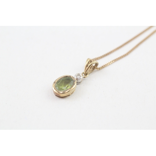 93 - 9ct gold peridot & diamond pendant necklace, bezel set (2.4g)