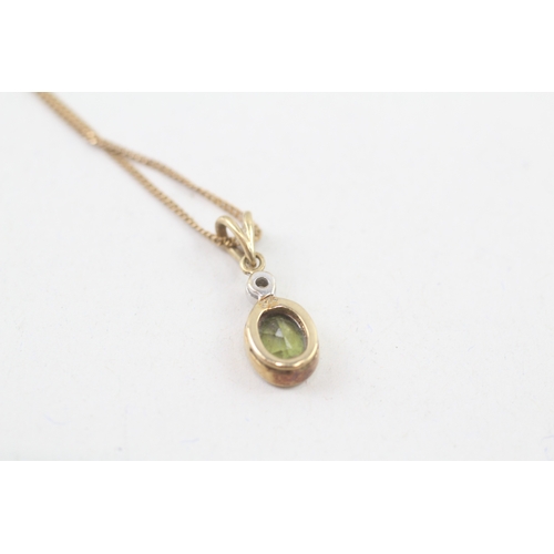 93 - 9ct gold peridot & diamond pendant necklace, bezel set (2.4g)