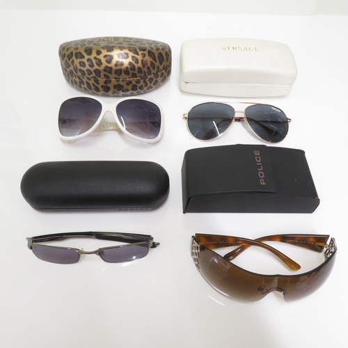 486 - 4 x Designer Sunglasses including Oakley, Police, Guess, Versace  - All with Cases