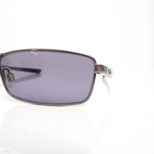 486 - 4 x Designer Sunglasses including Oakley, Police, Guess, Versace  - All with Cases