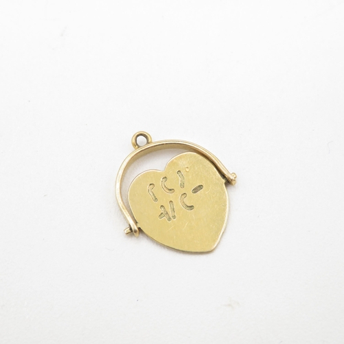 24 - 9ct gold vintage 'I love you' spinning heart shape charm (1.1g)