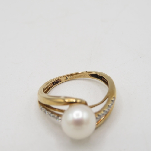 46 - 9ct gold cultured pearl & diamond dress ring (2.5g) Size  L