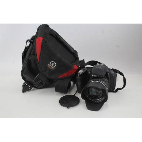 389 - Fujifilm Finepix HS10 Digital Bridge Camera Working w/ Fujinon Zoom Lens