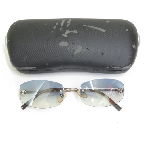 371 - 4 x Designer Sunglasses including Gucci / Chanel / FCUK / Police  - All with Cases
