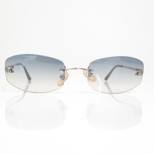 371 - 4 x Designer Sunglasses including Gucci / Chanel / FCUK / Police  - All with Cases