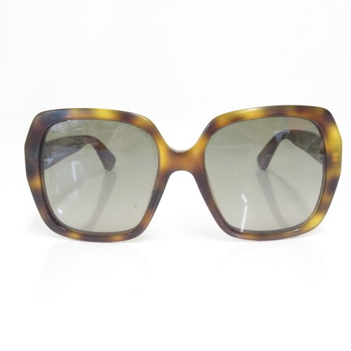 375 - 7 x Designer Sunglasses including  Gucci / French Connection / Timberland / Fossil / Dolce & Gabbana