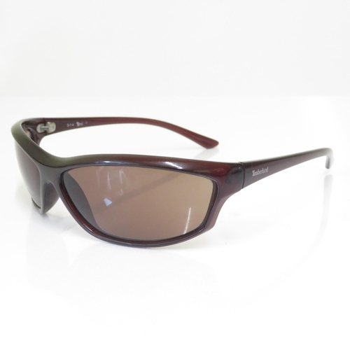 375 - 7 x Designer Sunglasses including  Gucci / French Connection / Timberland / Fossil / Dolce & Gabbana