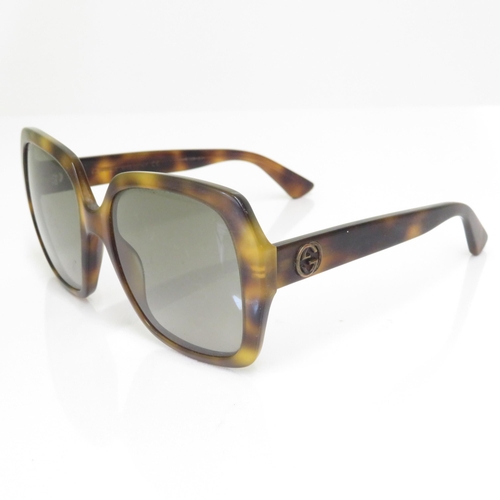 375 - 7 x Designer Sunglasses including  Gucci / French Connection / Timberland / Fossil / Dolce & Gabbana